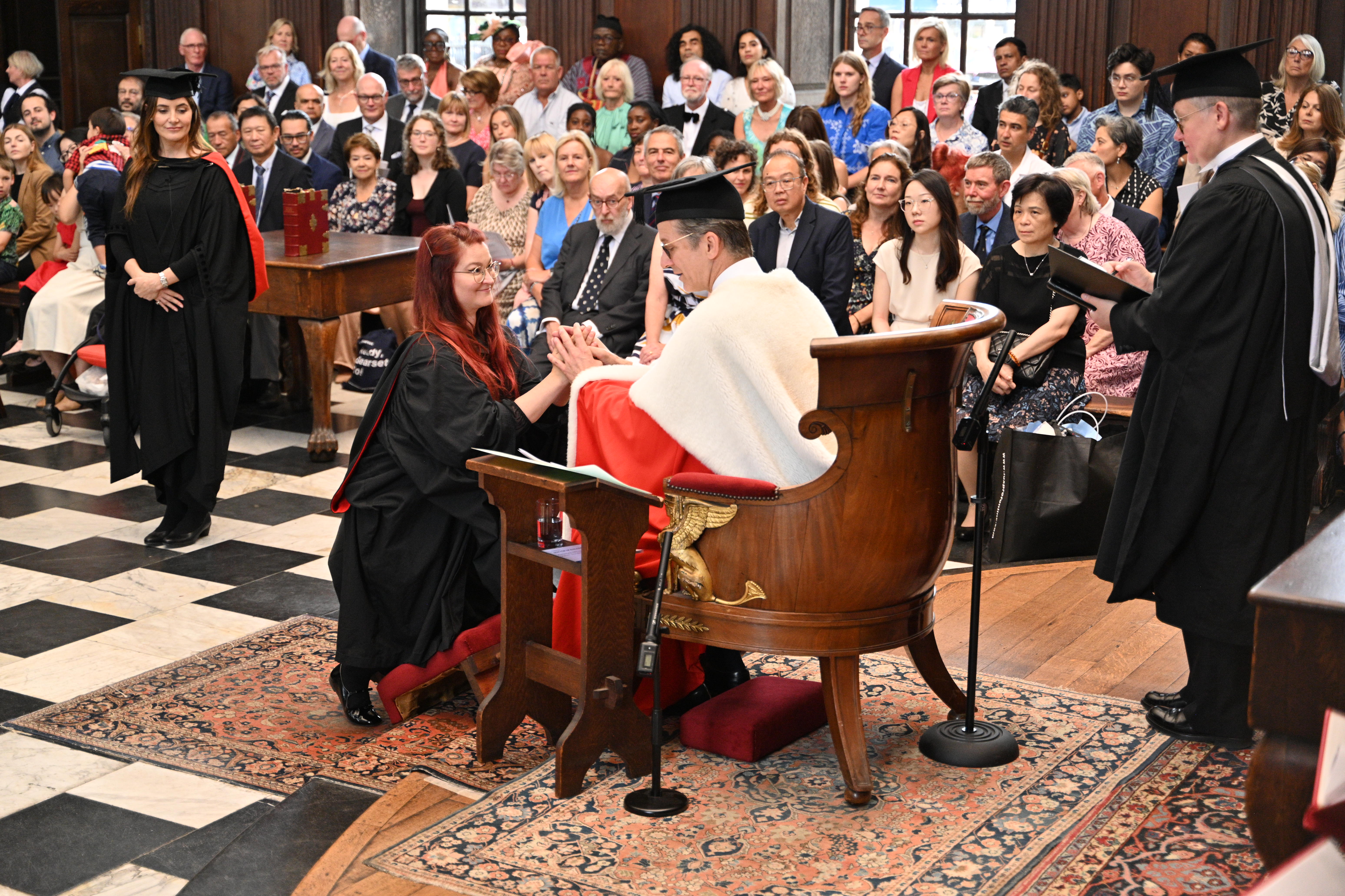 A woman getting her Cambridge degree.