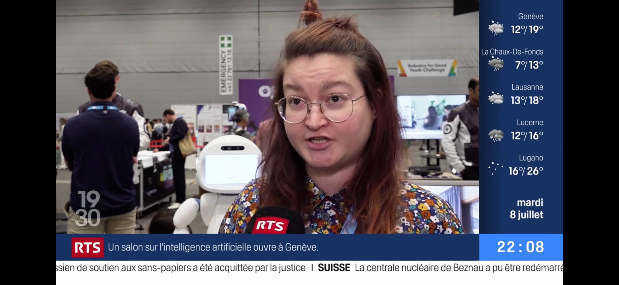 Woman giving TV interview.